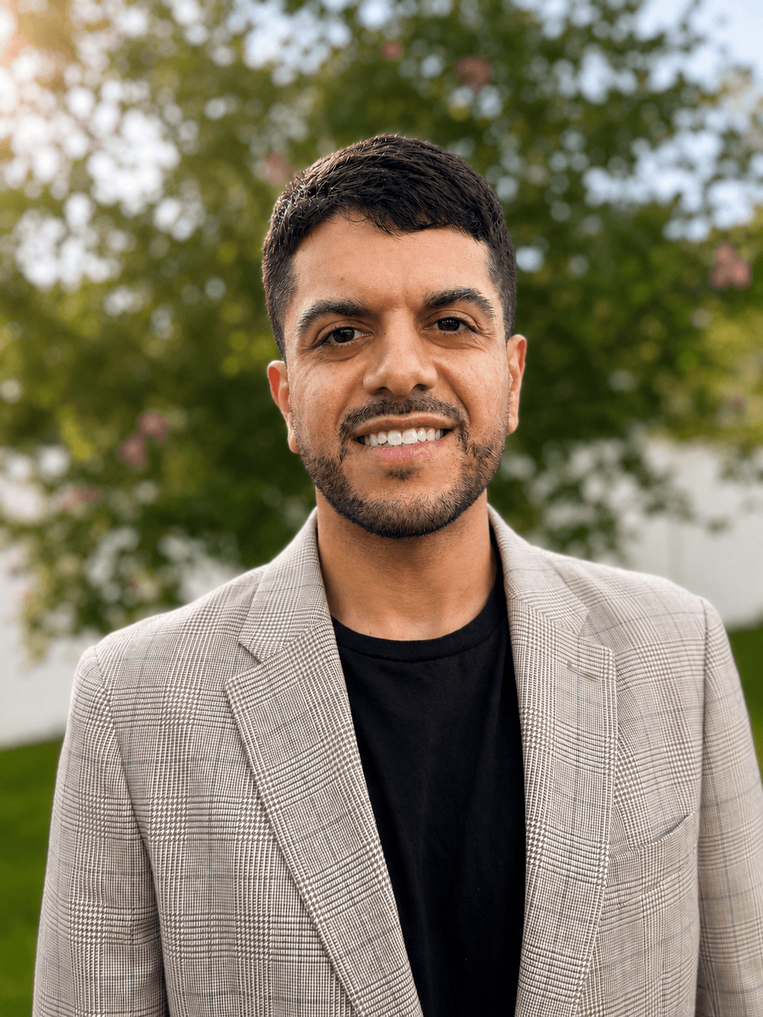Daniel Ferrena in a professional blazer headshot
